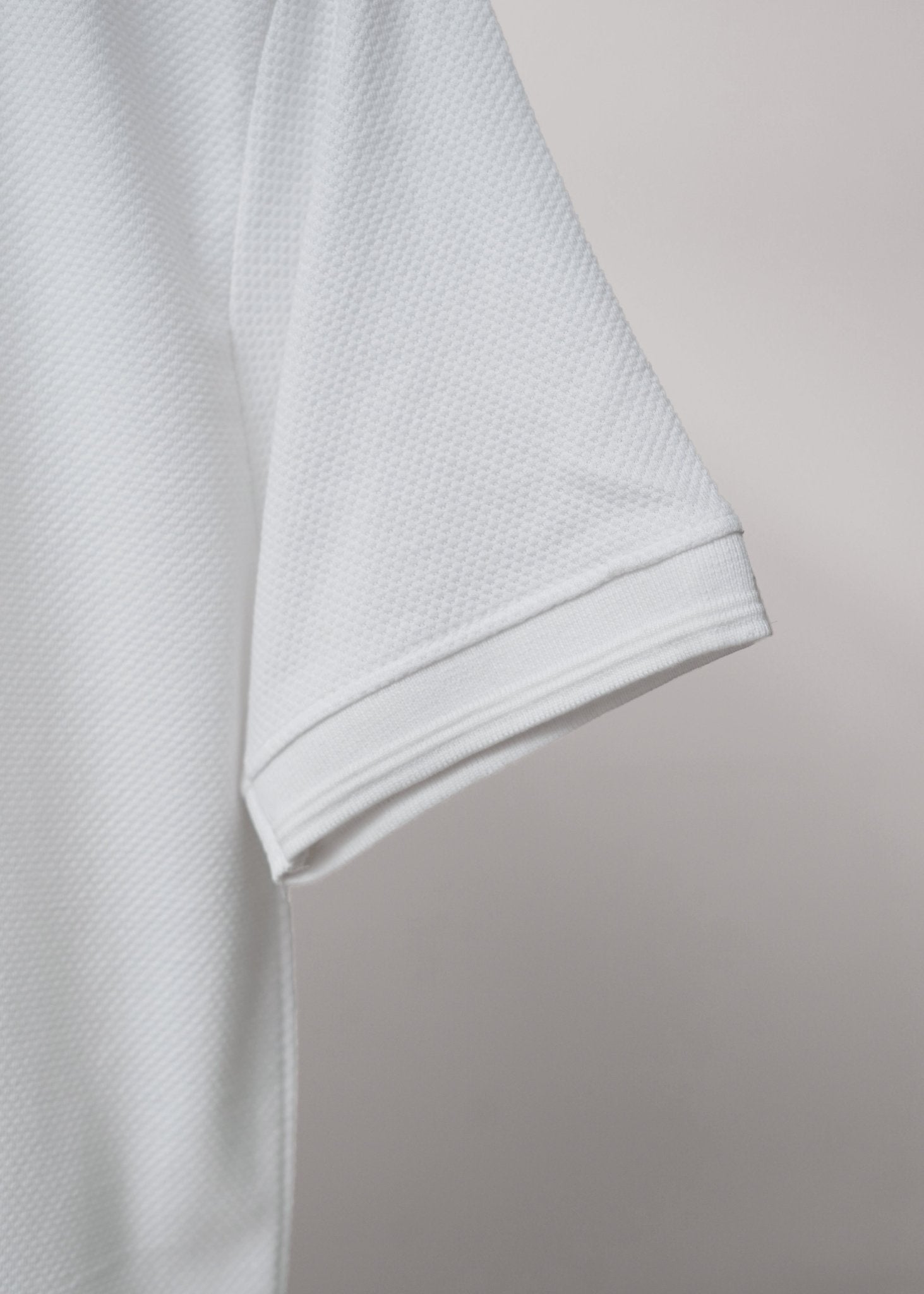 TEXTURED KINT WHITE POLO SHIRT